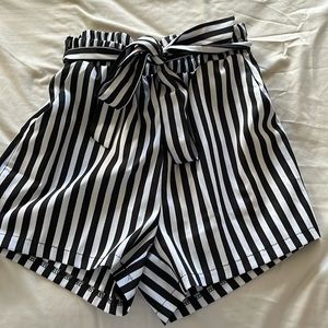 Black and white striped, flowy, dress shorts with tie; never worn